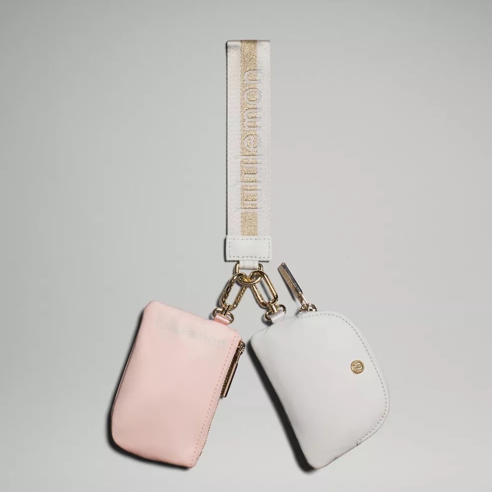 NEW BNWT LULULEMON DUAL POUCH WRISTLET Wordmark Color Vapor / Gold/ White